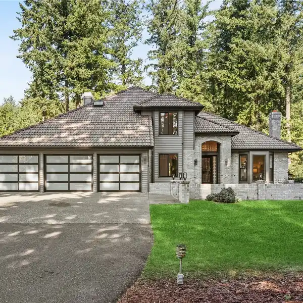 STYLISH RETREAT WITH EXPANSIVE DECK AND MODERN UPGRADES