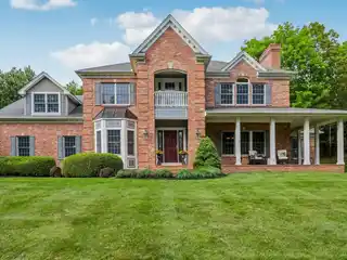 Distinguished Brick Colonial on a Gentle Hill