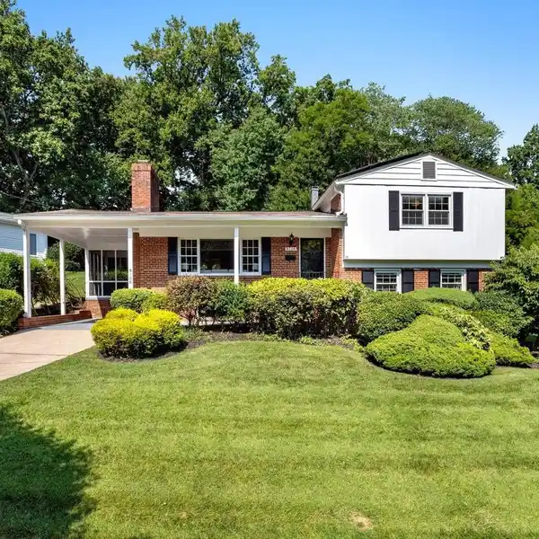 HANDSOME FAMILY HOME IN COVETED NEIGHBORHOOD