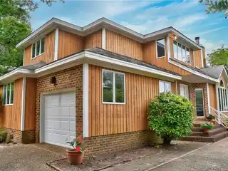 Vaulted Coastal Charm with Gleaming Interior Finishes