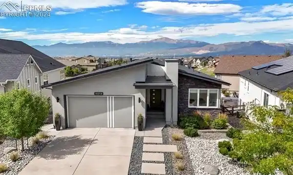 STUNNING MID-CENTURY MODERN WALK-OUT RANCHER
