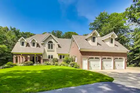 Stunning Two-Story Brick Residence Perched on a Scenic Hill