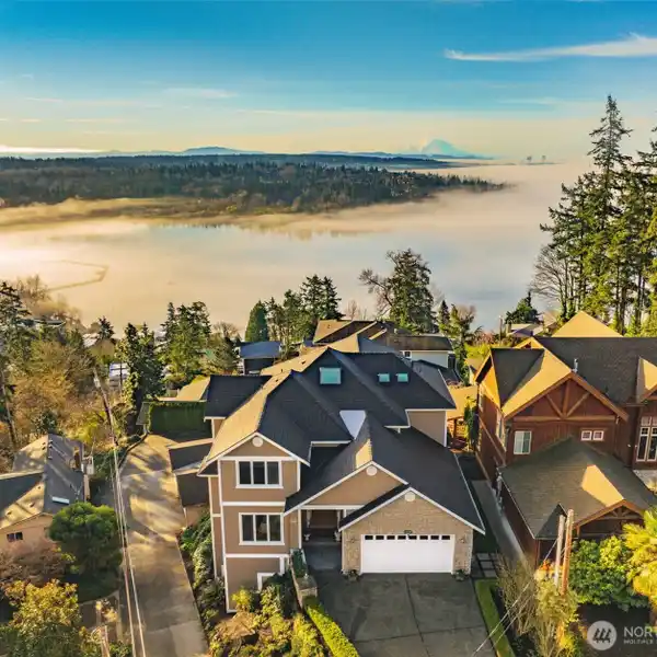 EXCEPTIONAL HOME WITH SWEEPING ELEVATED VIEWS