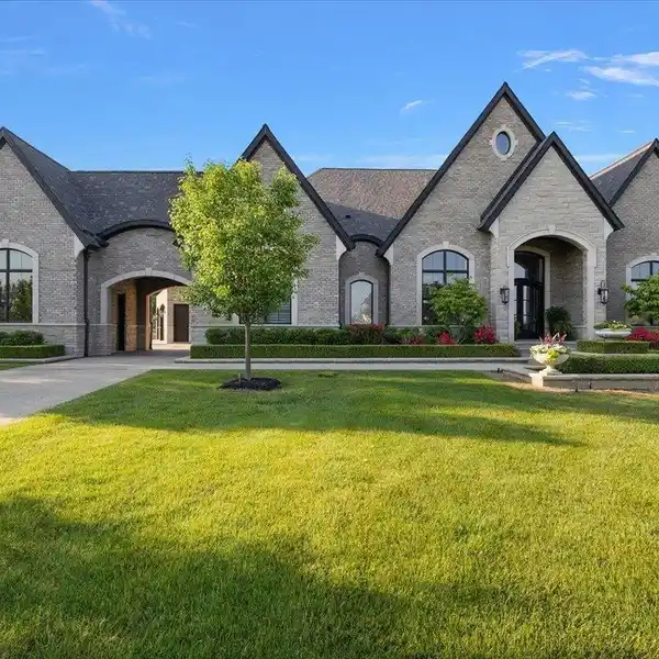 DESIGNER SHOWCASE CUSTOM HOME IN SOUGHT-AFTER SEVEN LAKES