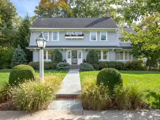 Classic Colonial with Modern Upgrades and Expansive Yard