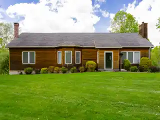 Cedar-Sided Traditional Home on 23 Acres