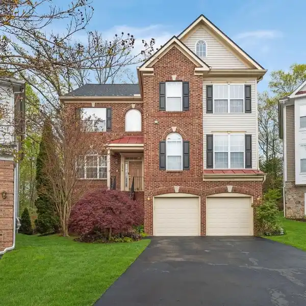 ELEGANT BRICK-FRONT HOME WITH SCENIC BACKYARD