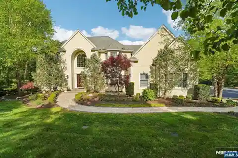 Elegant Colonial on Two Lush Acres