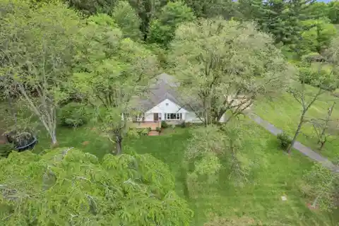 Elegant Custom Home on 9+ Private Acres