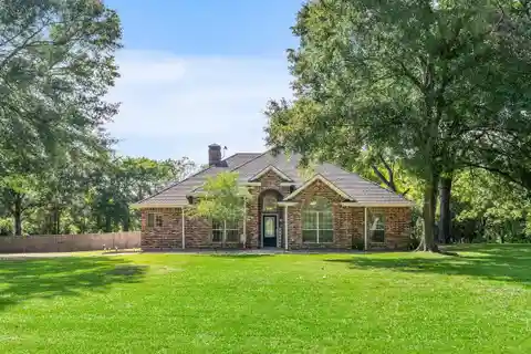 Rare Waterfront Acreage with Open Layout Home