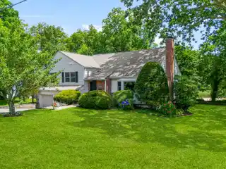 Spacious Split Ranch Overlooking the Green