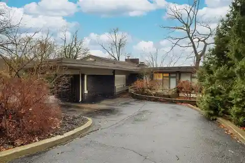 Mid-century Modern Home in a Private Wooded Enclave