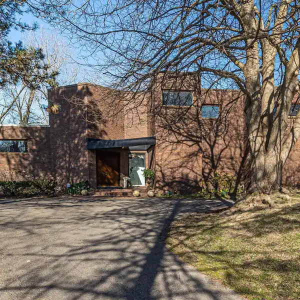 EXQUISITELY DESIGNED BRICK COLONIAL
