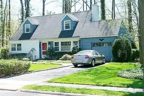 Expanded Brick Ranch Home in Kings Point Village