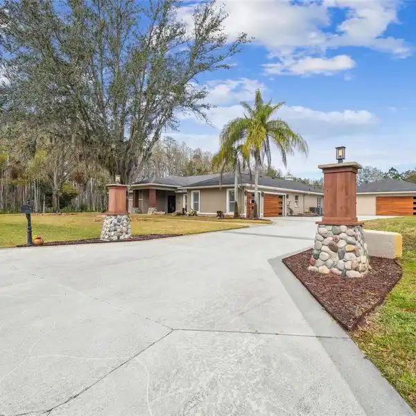 EXQUISITE LAKESIDE ESTATE ON NEARLY THREE ACRES