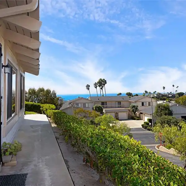 SPACIOUS CONDO WITH GLASS SLIDERS AND COASTAL VIEWS