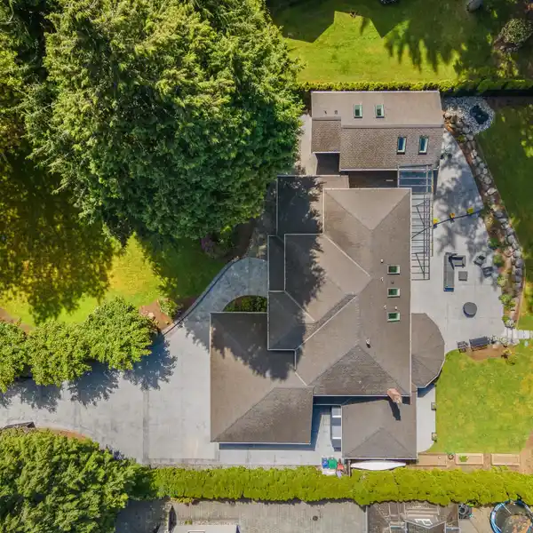 ELEGANT ESTATE WITH SERENE CREEKSIDE BACKYARD