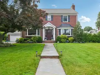 Beautifully Updated and Expanded Brick Colonial