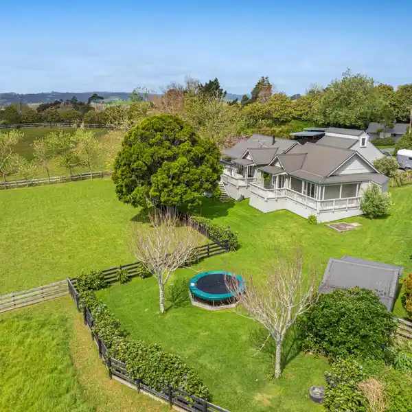 RESTORED BUNGALOW ON EXPANSIVE EQUESTRIAN GROUNDS