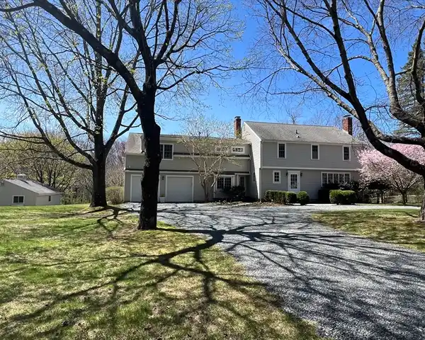 EXTENSIVELY RENOVATED AND EXPANDED COLONIAL HOME