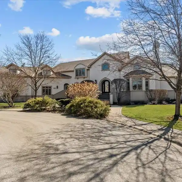ELEGANT AND EXPANSIVE CUSTOM HOME IN COVETED THORNGATE SUBDIVISION
