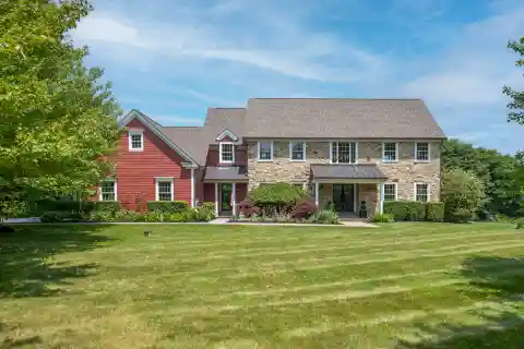 Stunning Colonial on Private Three-acre Setting