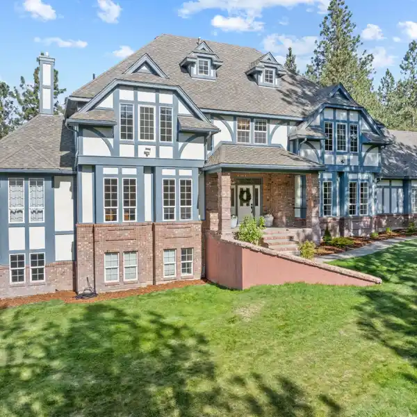 ENGLISH TUDOR BEAUTY ON A SECLUDED LOT