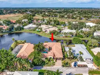 Elegant Courtyard Estate with Lake Views and Guest House