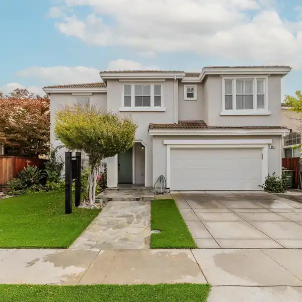 VAULTED ELEGANCE WITH GENEROUS WINDOWS