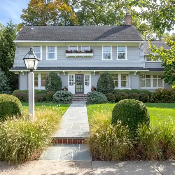 CLASSIC COLONIAL WITH MODERN UPGRADES AND EXPANSIVE YARD