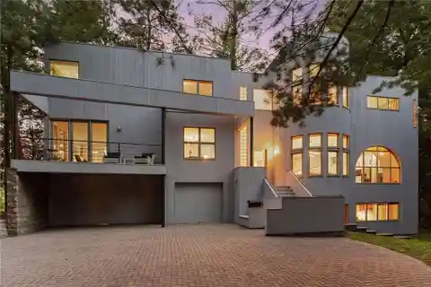 Modern Masterpiece in a Forested Setting