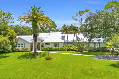 Tropical Poolside Living on Expansive Acreage