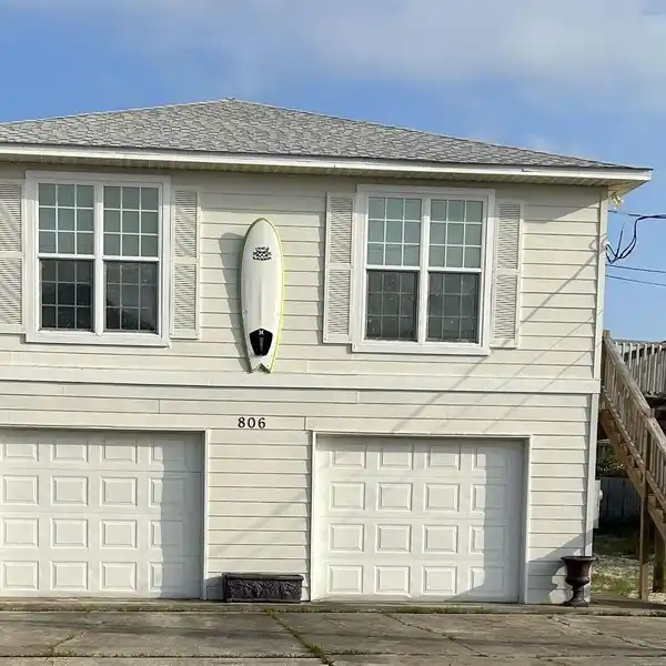 UNIQUE THREE BEDROOM HOME STEPS TO THE BEACH