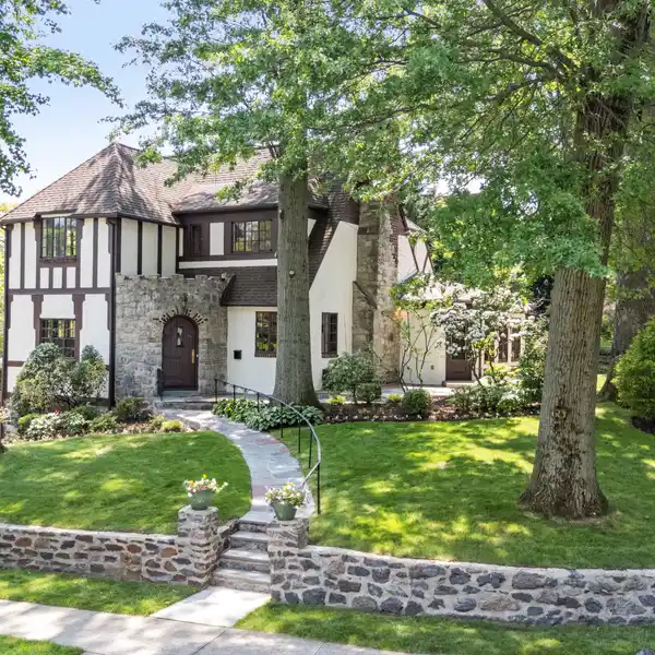 STORYBOOK TUDOR ON A PRIME CORNER LOT