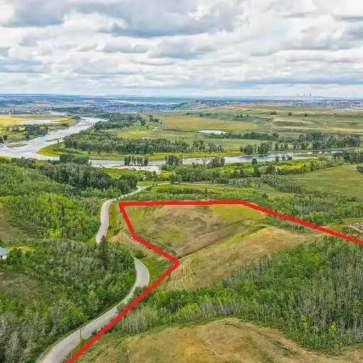 OVER NINE ACRES WITH RIVER AND MOUNTAIN VIEWS