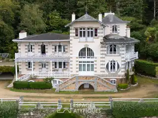 Architectural Gem Surrounded by Lush Parkland