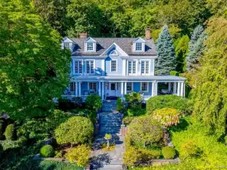 Storybook Home with Riverfront Grace