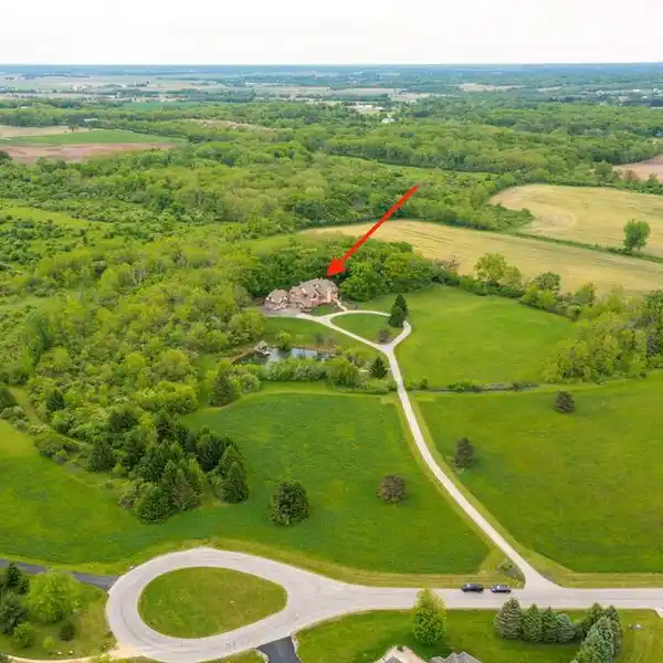 VERSATILE ESTATE ON PRIVATE ACREAGE WITH VIEWS