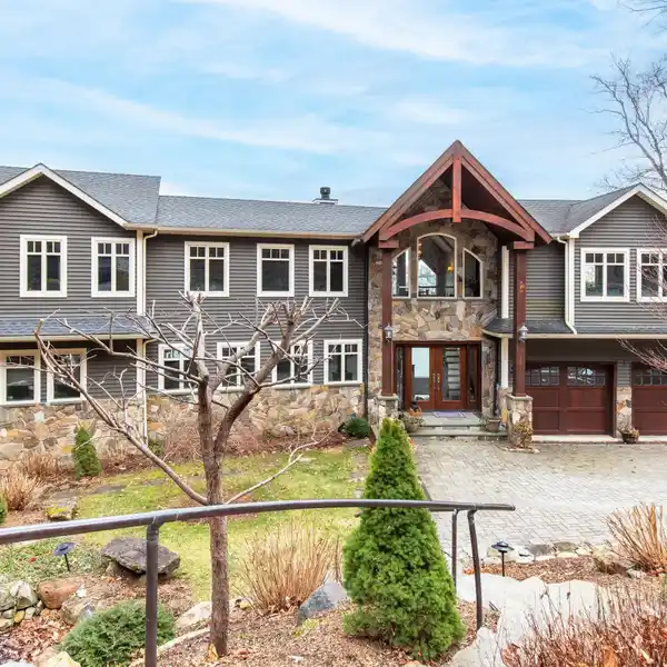 BREATHTAKING WATERFRONT ESTATE ON PRESTIGIOUS CANDLEWOOD ISLE