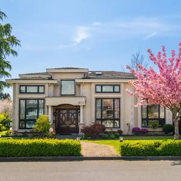 EUROPEAN-INSPIRED CUSTOM HOME ON AN EXPANSIVE CORNER LOT