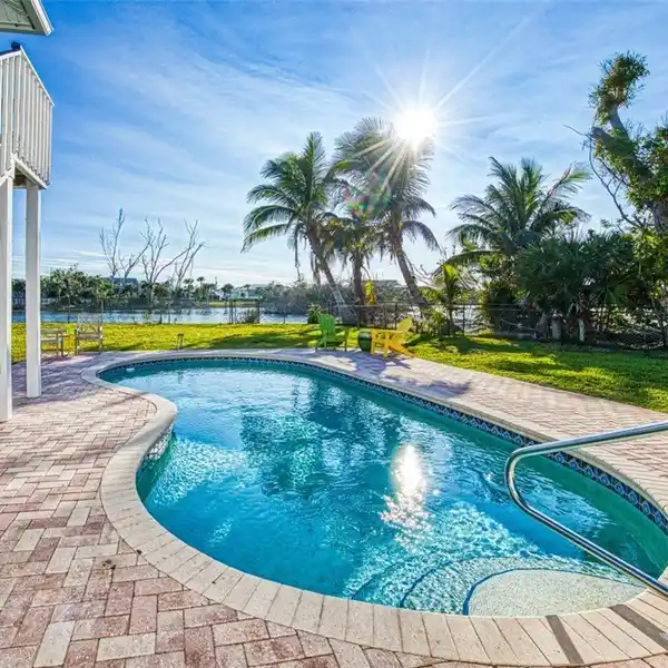 RELAXED COASTAL LIVING WITH OVERSIZED SCREENED PORCH