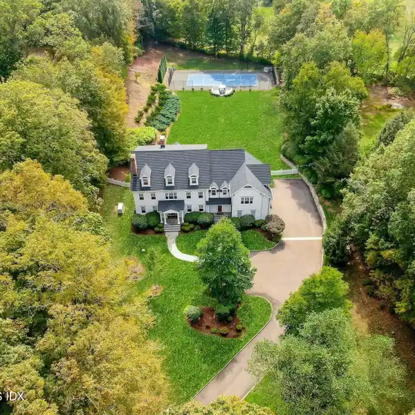 IMPRESSIVE AND INVITING GREENFIELD HILL HOME