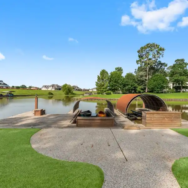 GATED WATERFRONT GEM WITH TWO BOAT SLIPS