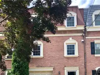 Tree-lined Elegance Steps from Campus Life