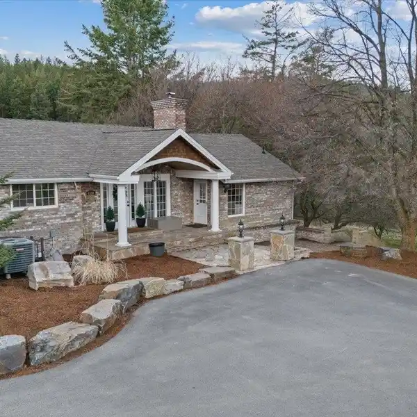 EXTRAORDINARY SOUTH HILL HOME ON NEARLY 9 ACRES