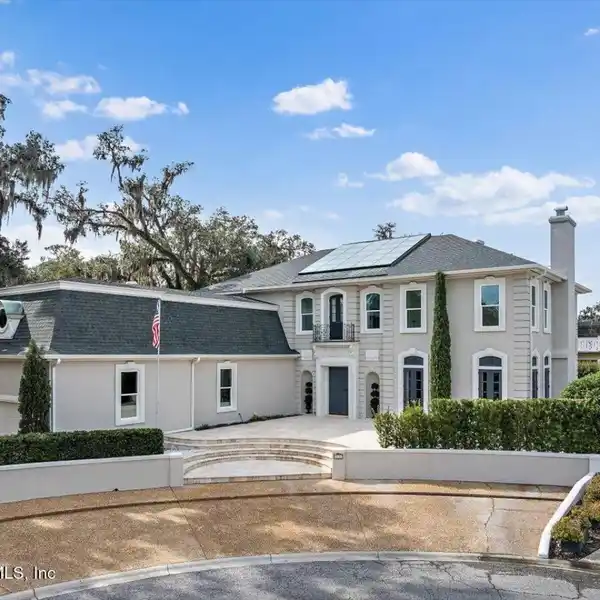 BEAUTIFULLY RENOVATED HOME IN A PRIVATE GATED ENCLAVE