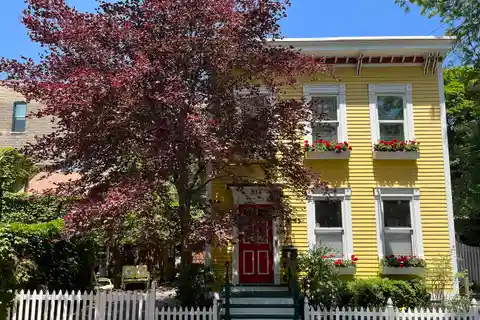 Iconic 1875 Old Town Yellow House