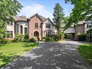 Gorgeous Custom Home on Private Wooded Property