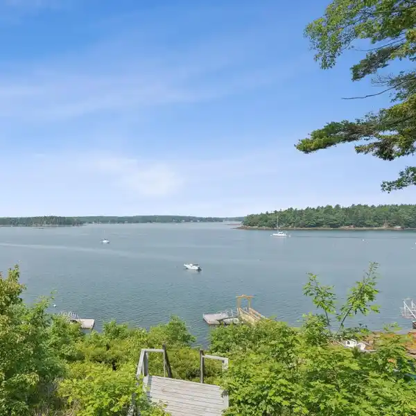 RARE WATERFRONT ACREAGE WITH CLASSIC COASTAL COTTAGE