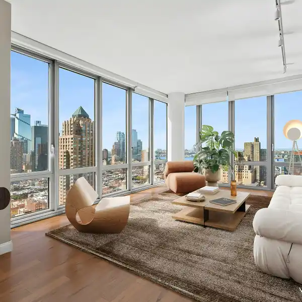 SUN-FILLED CORNER HOME HIGH ABOVE MIDTOWN